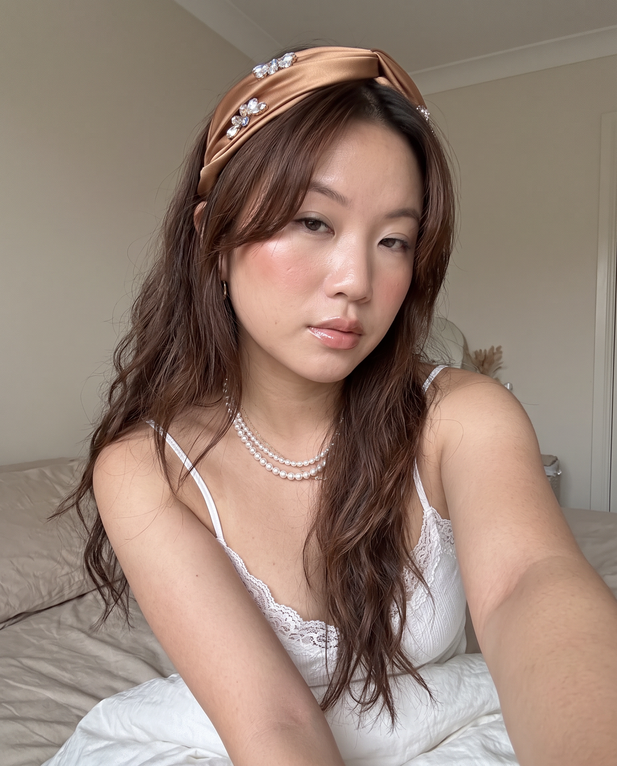 Satin Crystal Flower Knot Headband - Amber, on model